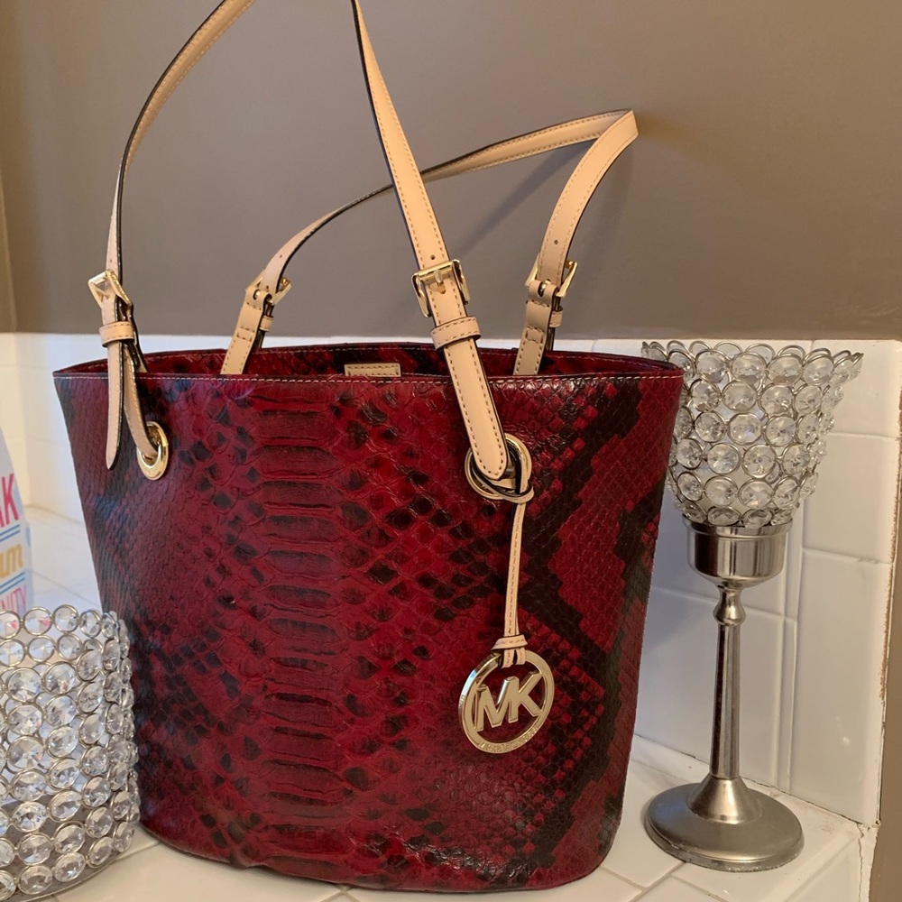 Beautiful new red snake print MK tote.